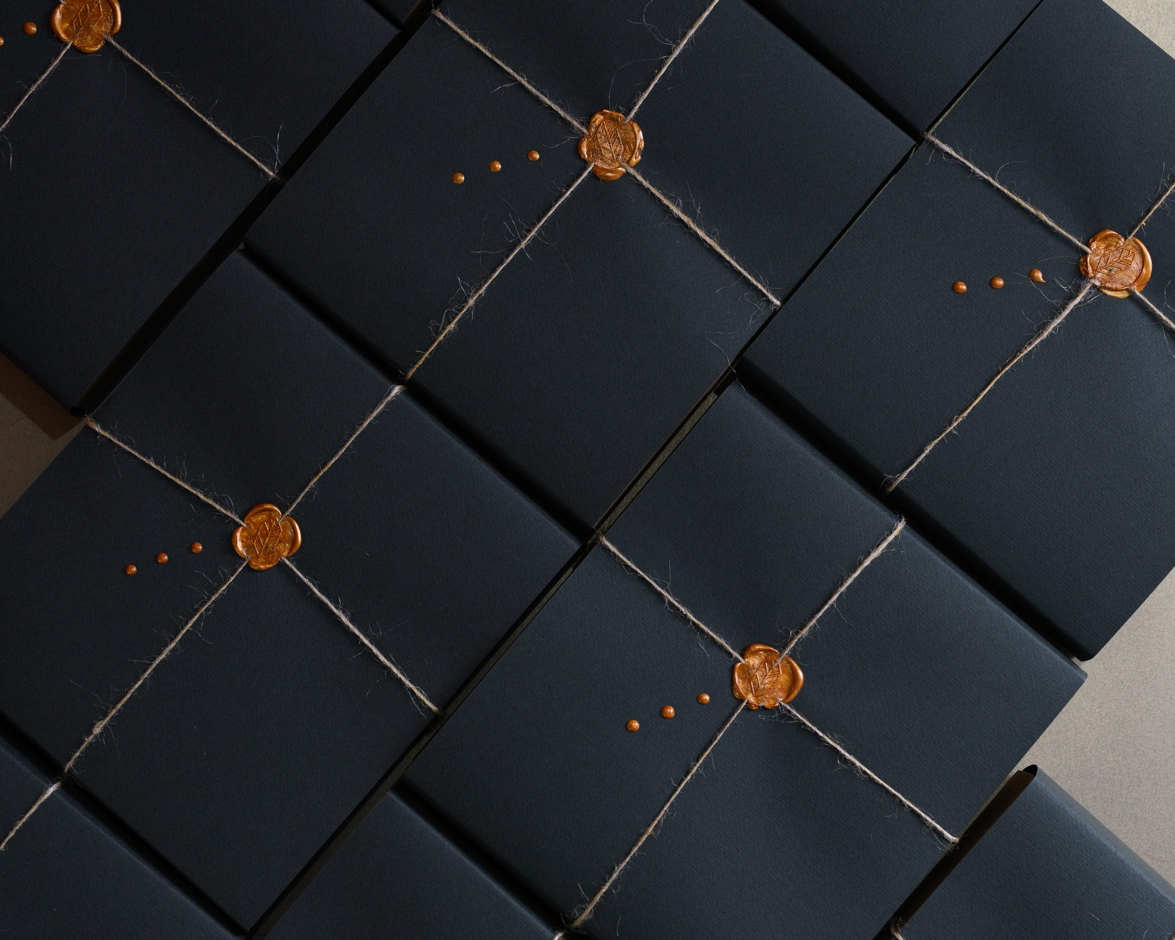 Dark blue corporate wrepping with gold stamp