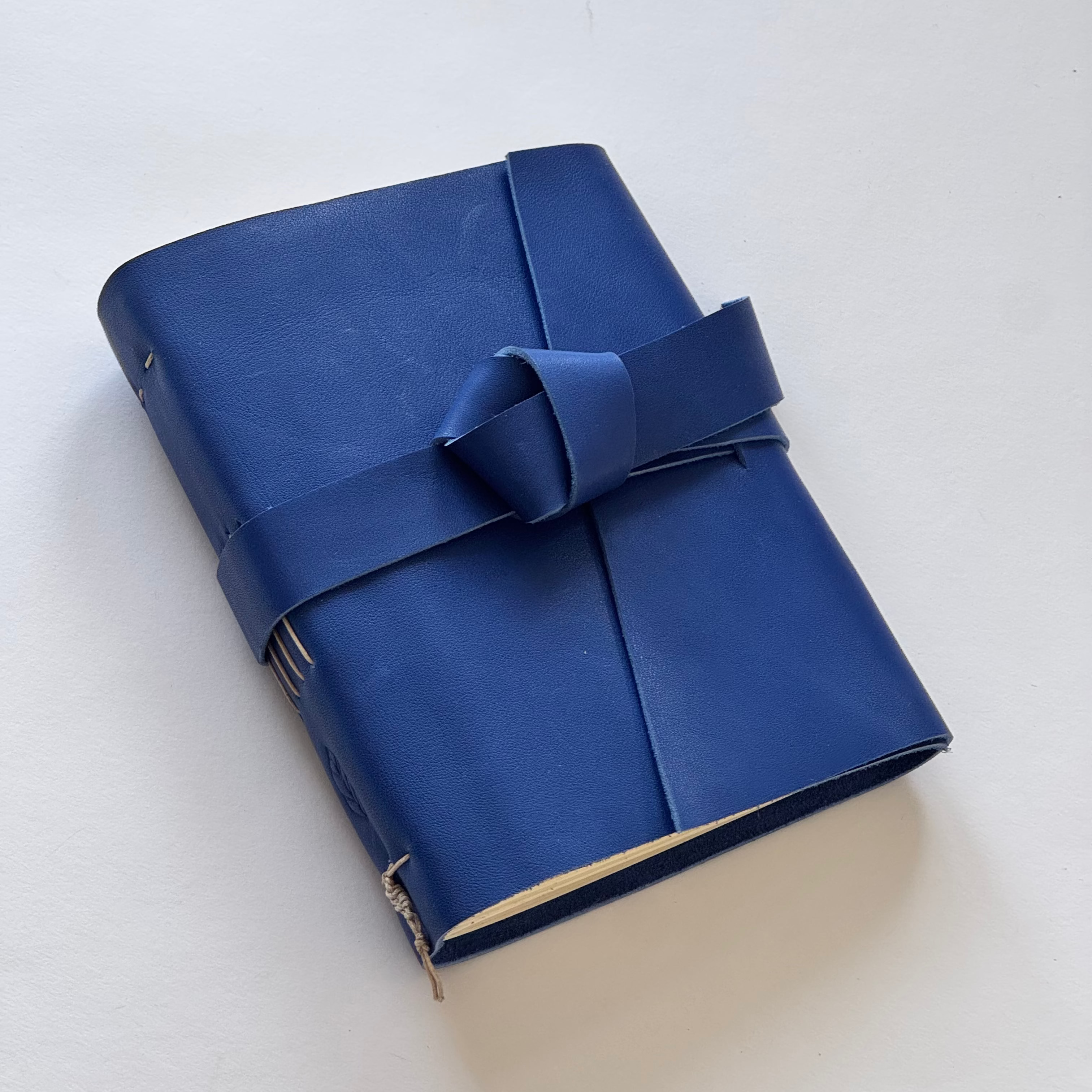 dark blue handmade leather photo journal