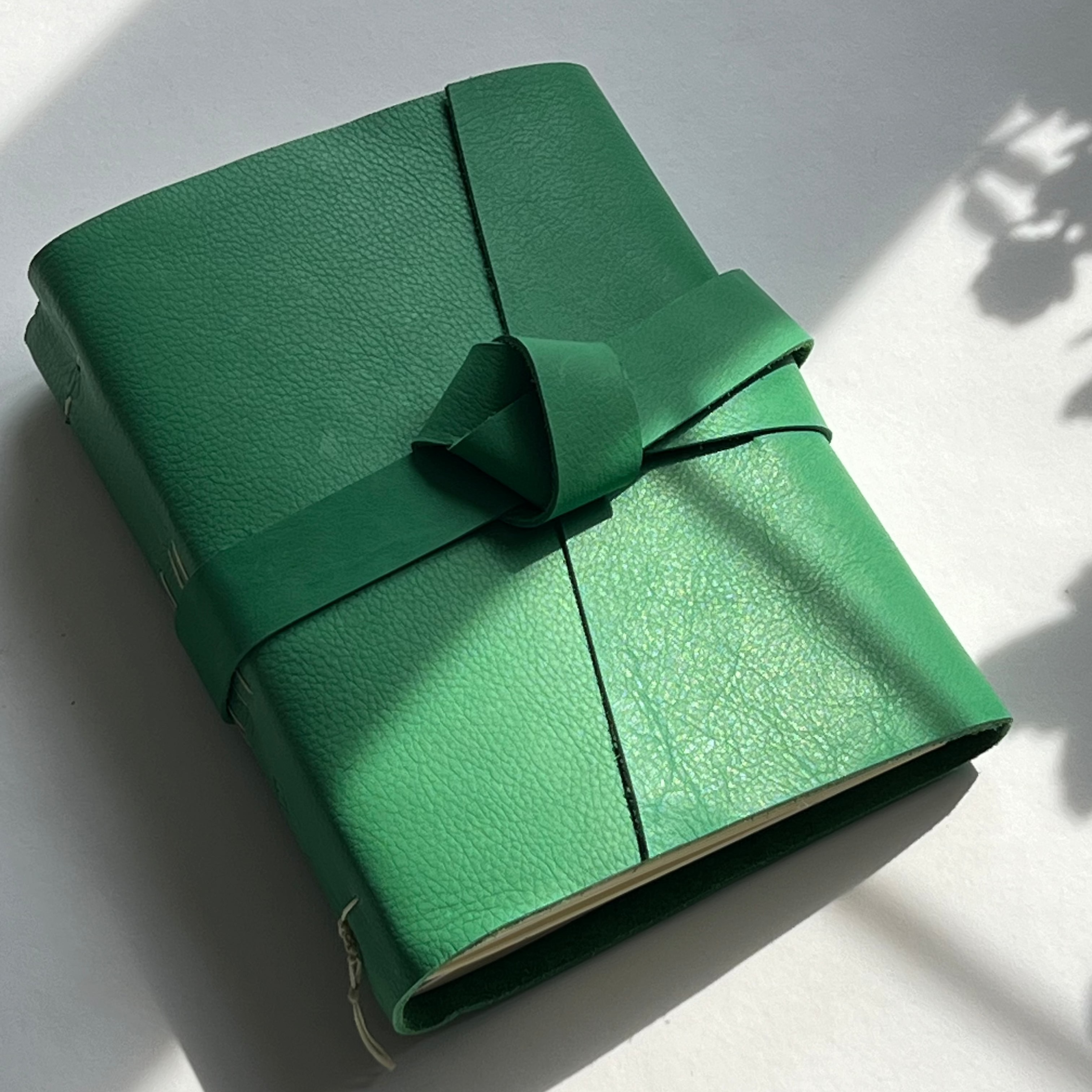 sage green leather photo journal with custom engraving