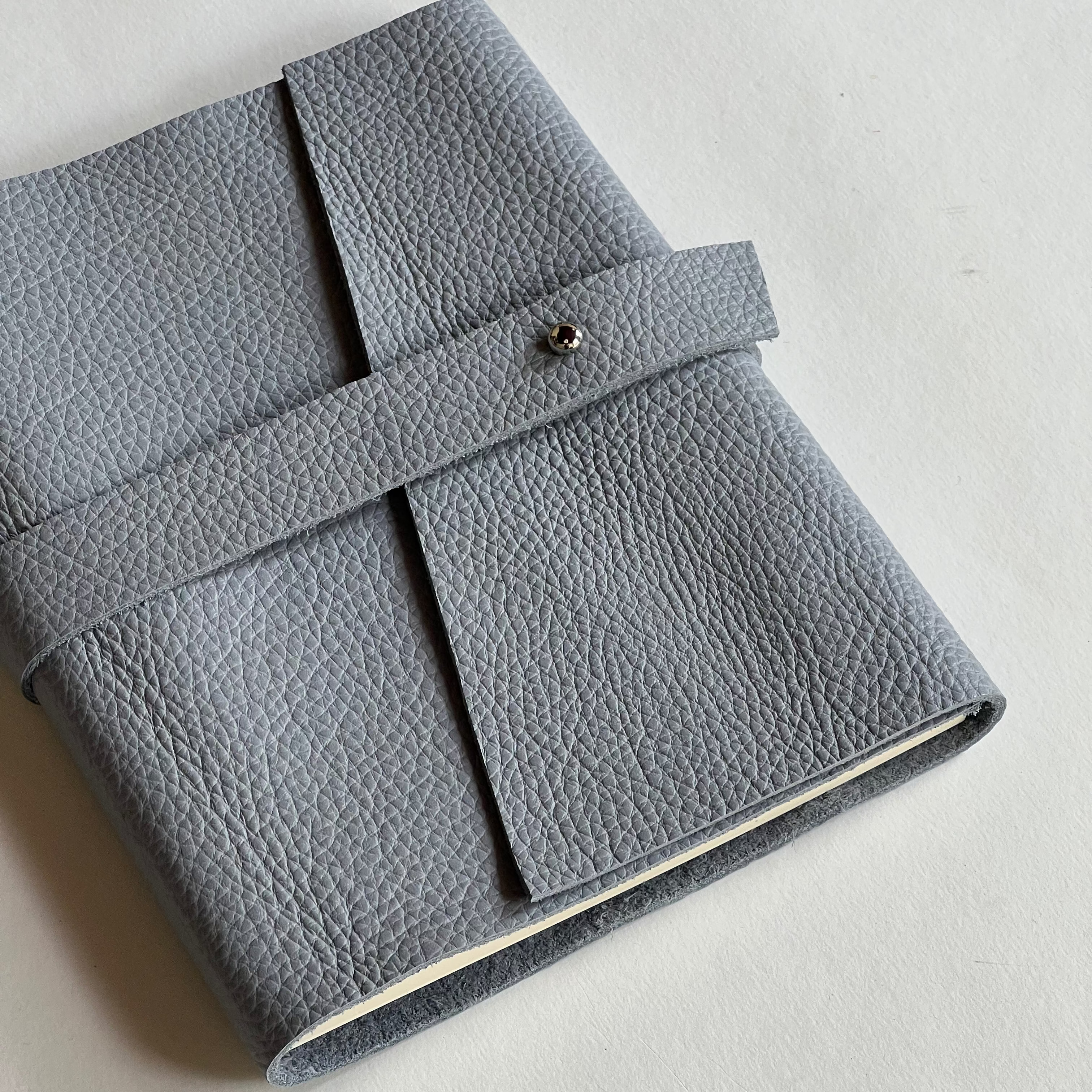 Greyish blue leather notebook 