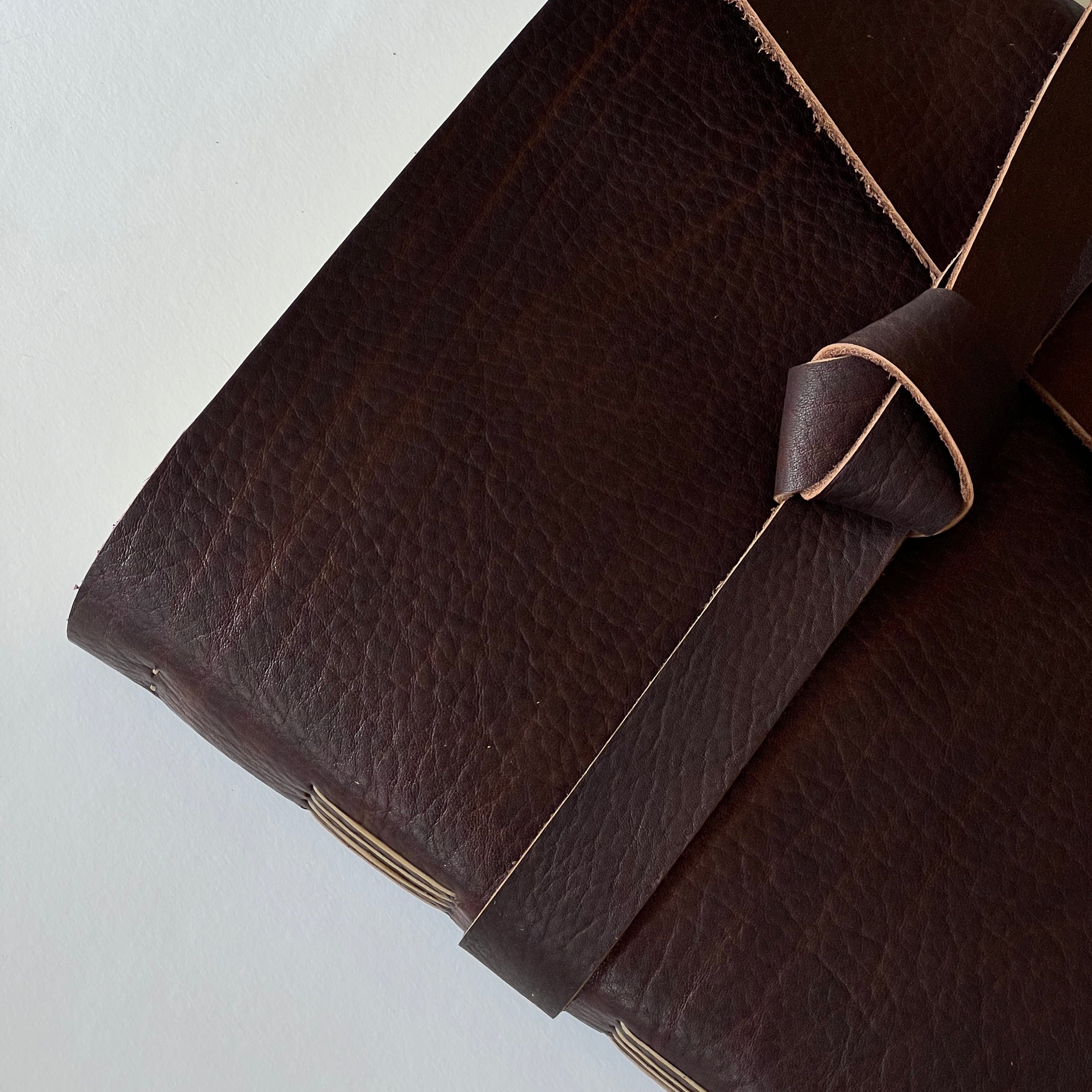 brown leather handmade photo album with custom engraving