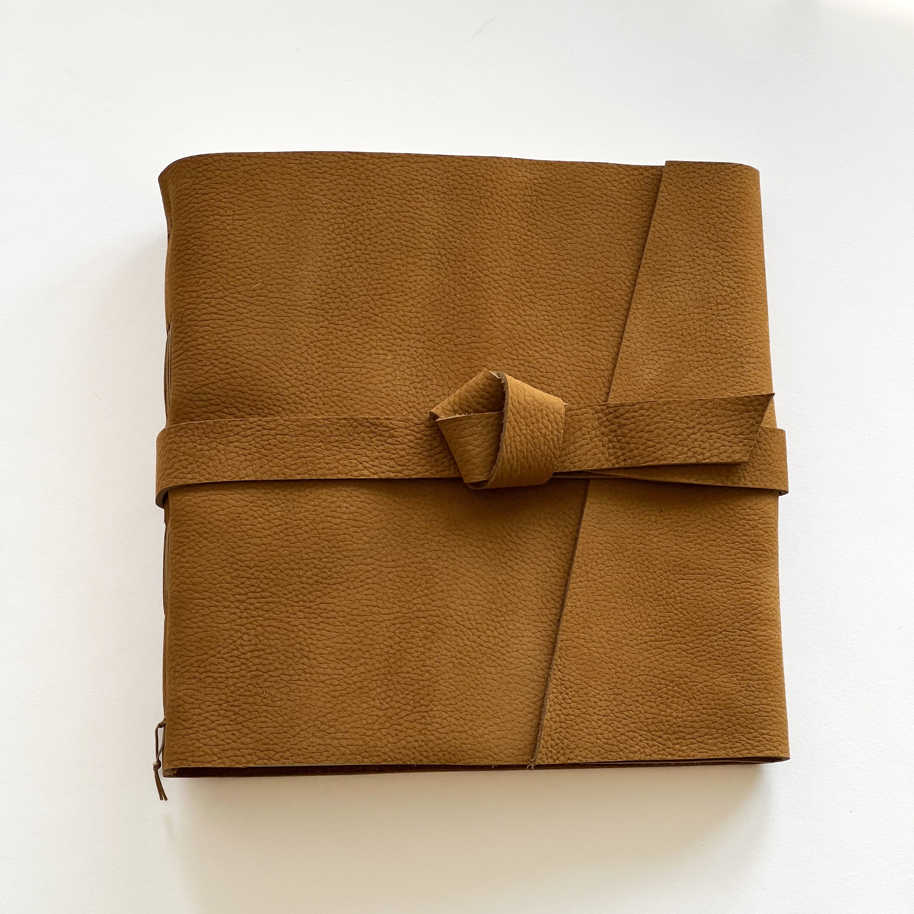 handmade honey leather photo album with custom engraving