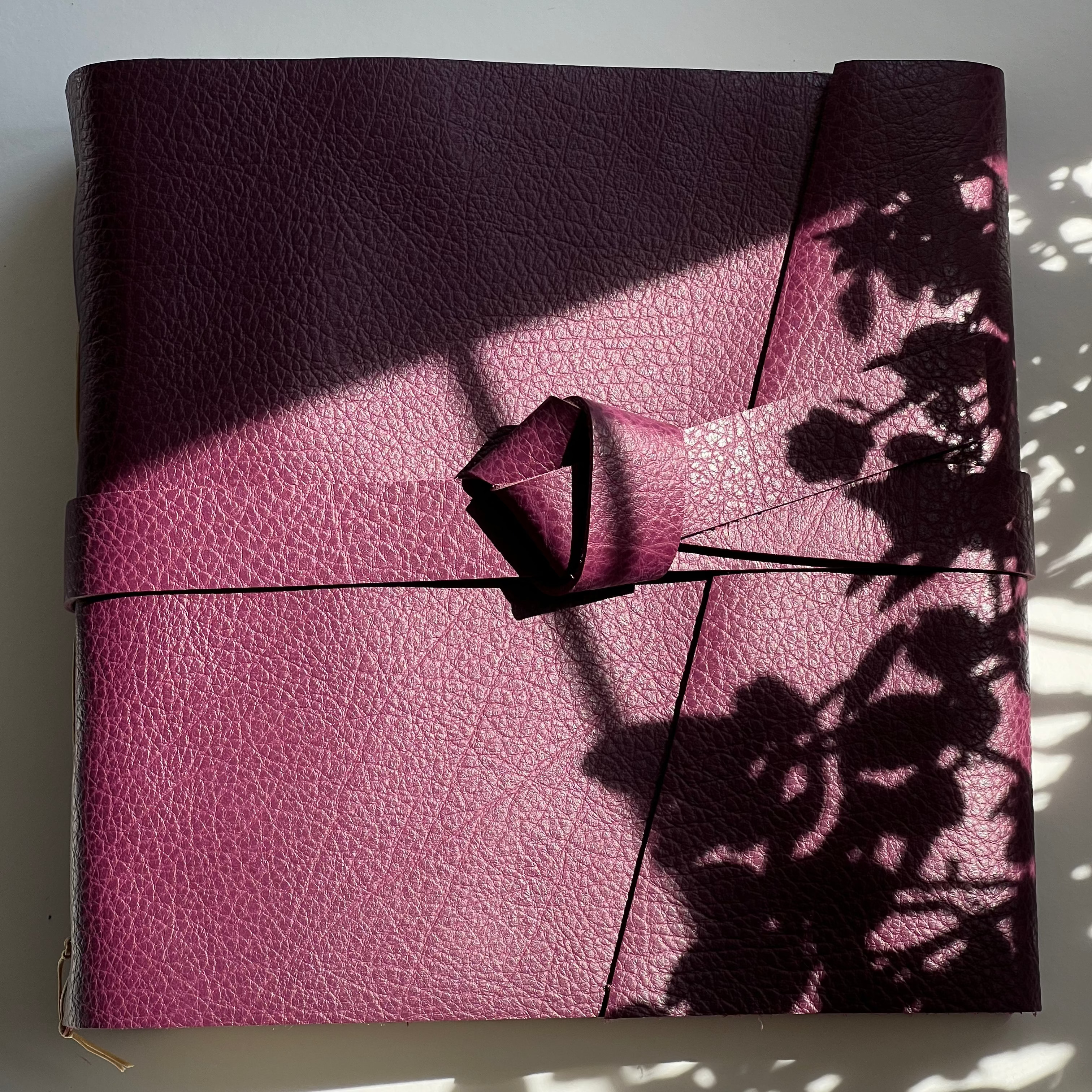 plum leather photo album with custom engraving